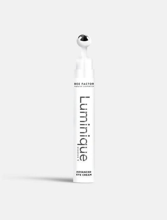 Κρέμα ματιών Luminique Essence 5 της Bee Factor σε λευκή συσκευασία 15ml με μεταλλικό ρολερ – προηγμένη φροντίδα για λείανση ρυτίδων και φωτεινό βλέμμα, διαθέσιμη στο Eiria.