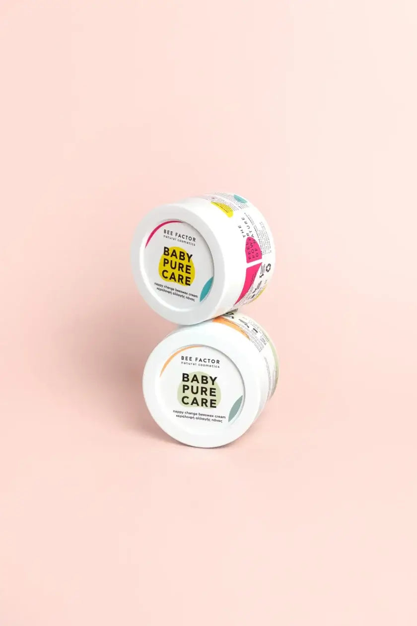 Δύο κεραλοιφές Baby Pure Care Bee Factor από 0 έσως 6 μηνών και 6 μηνών + για αλλαγή πάνας βρεφών – 100% φυσική σύνθεση με κερί μέλισσας – ιδανικές για σύγκαμα – διαθέσιμες στο Eiria Cosmetics