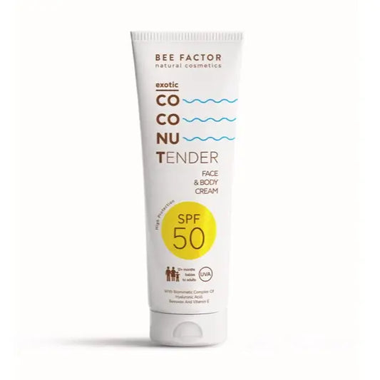 Η Exotic Coconut Tender Cream SPF 50 της Bee Factor Natural Cosmetics σε λευκή σωληναριακή συσκευασία, σχεδιασμένη για πρόσωπο και σώμα με υψηλή αντηλιακή προστασία. Στην μπροστινή όψη διακρίνονται το λογότυπο “Bee Factor natural cosmetics”, η ονομασία “Exotic Coconut Tender”, η ένδειξη “Face & Body Cream” και το έντονο σήμα “SPF 50”, ενώ αναφέρεται επίσης ότι είναι κατάλληλη για βρέφη άνω των 12 μηνών, παιδιά και ενήλικες. Στο κάτω μέρος επισημαίνονται συστατικά όπως βιομιμητικό έλαιο καρύδας, beeswax και 