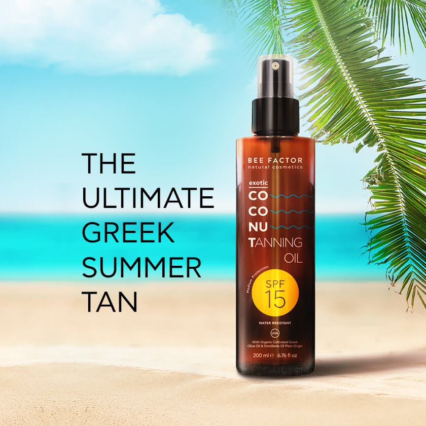 Αντηλιακό λάδι σώματος Bee Factor Exotic Coconut SPF 15 σε παραλία με φοινικιά και σλόγκαν "The Ultimate Greek Summer Tan" – φυσική προστασία και εξωτικό μαύρισμα διαθέσιμο από το eiria.gr.